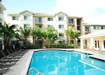 Pool with lounge chairs Harbour Cove Hallandale Beach Florida